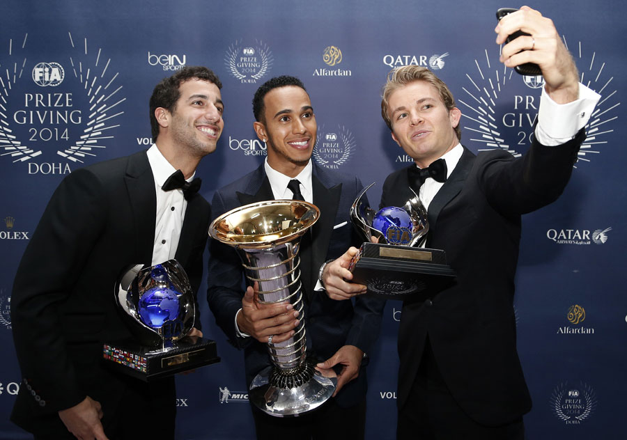 Lewis Hamilton poses for a selfie with Daniel Ricciardo and Nico Rosberg