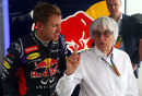 Bernie Ecclestone pays a visit to Sebastian Vettel in the Red Bull garage
