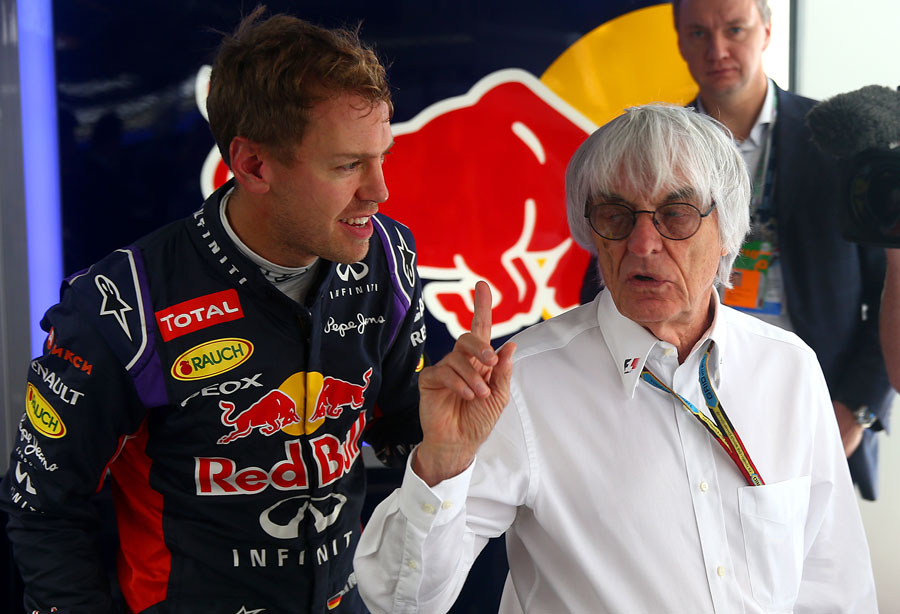 Bernie Ecclestone pays a visit to Sebastian Vettel in the Red Bull garage
