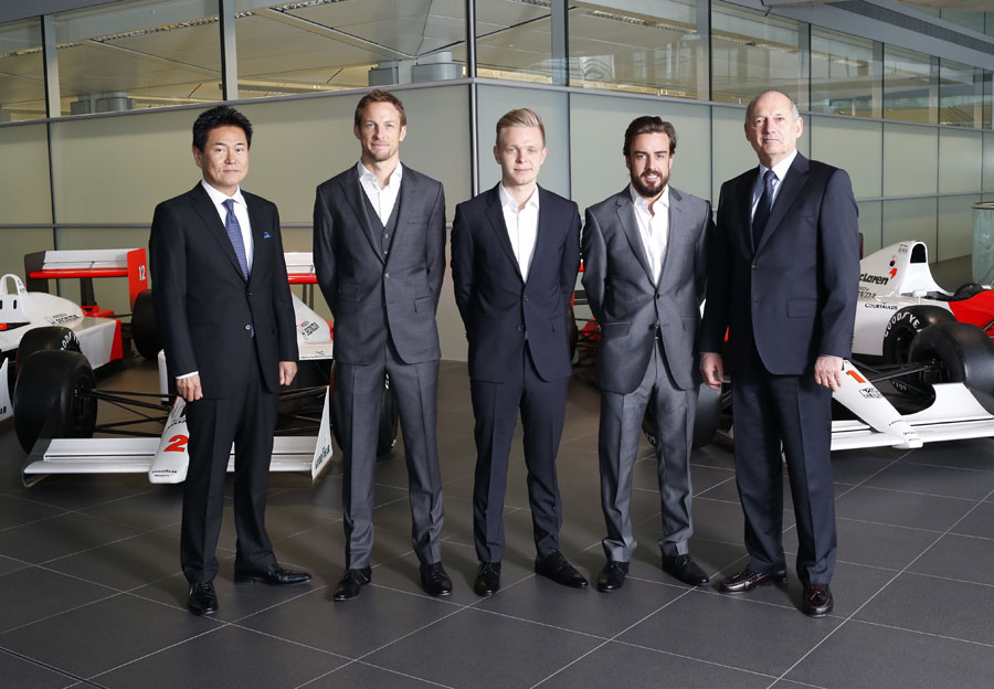 Yasuhisa Arai of Honda, Jenson Button, Kevin Magnussen, Fernando Alonso and Ron Dennis pose for a photo
