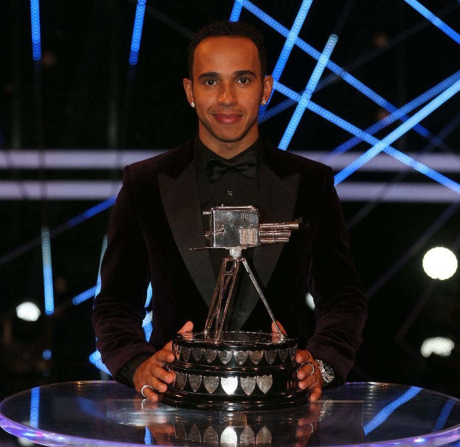 Lewis Hamilton poses with the BBC's Sports Personality of the Year award