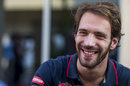 Jean-Eric Vergne shares a joke in the paddock