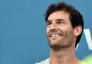 Former F1 driver Mark Webber is all smiles at the  Brisbane International tennis tournament in Brisbane 