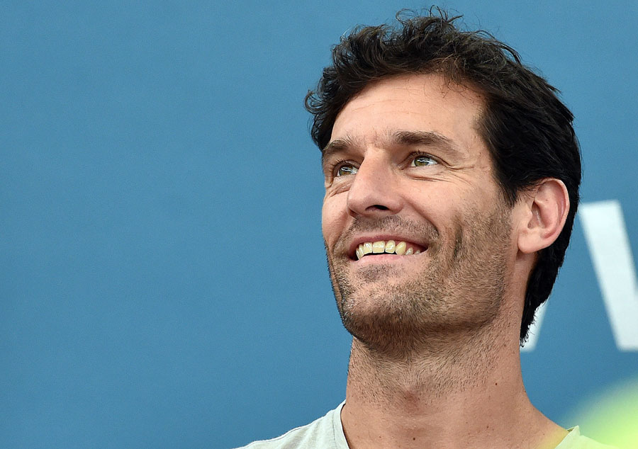 Former F1 driver Mark Webber is all smiles at the  Brisbane International tennis tournament in Brisbane 