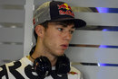 Pierre Gasly looks on in the Red Bull paddock