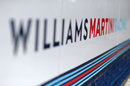 A close-up of the Williams logo with its Martini colours