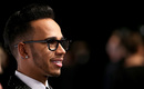 Reigning world champion Lewis Hamilton looks on during a gala dinner in Switzerland