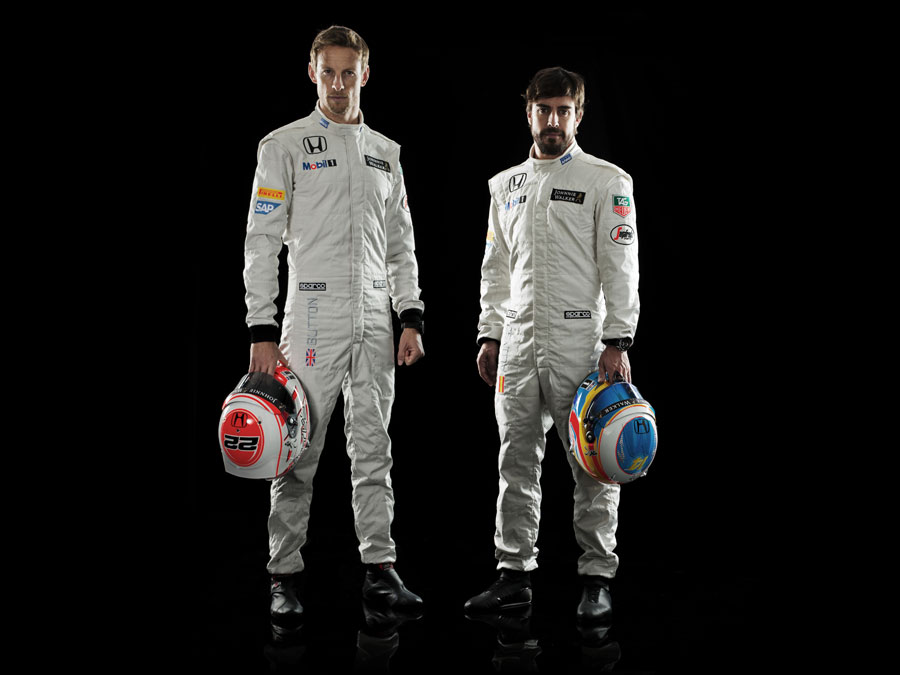 Jenson Button and Fernando Alonso pose for a photo
