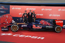Max Verstappen and Carlos Sainz Jr pose with the Toro Rosso STR10 in the Jerez pit lane