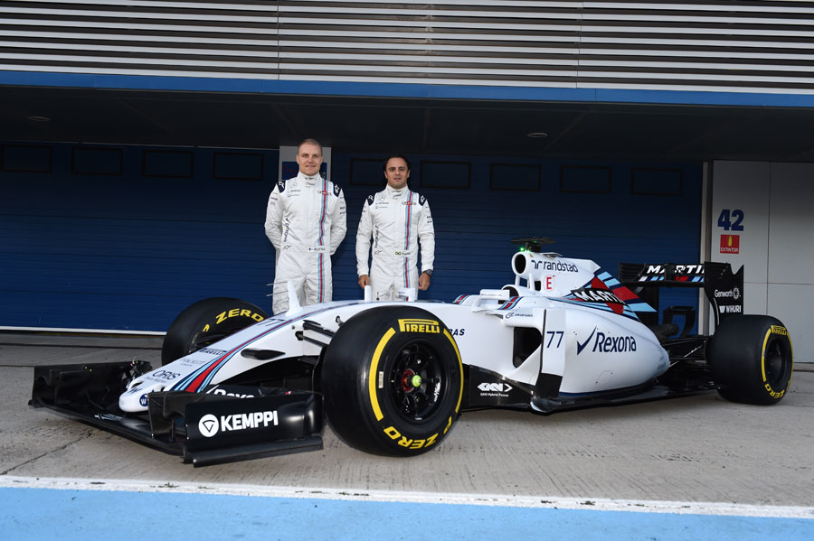 Valtteri Bottas and Felipe Massa pose with the Williams FW37