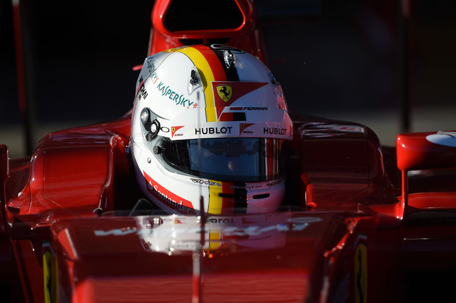 Sebastian Vettel wearing his new helmet ahead of his first day in the Ferrari SF15-T
