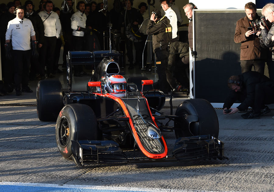 Jenson Button heads out for his first run in the McLaren MP4-30