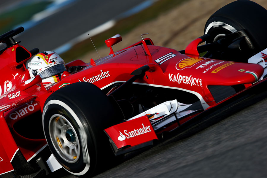 Sebastian Vettel gets the power down in his Ferrari