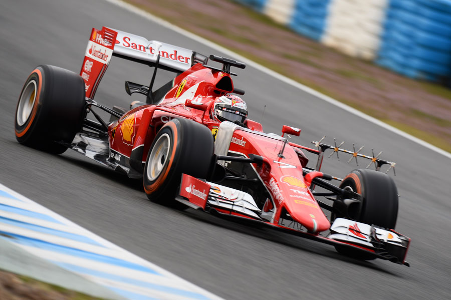 Kimi Raikkonen gets down to work in the Ferrari