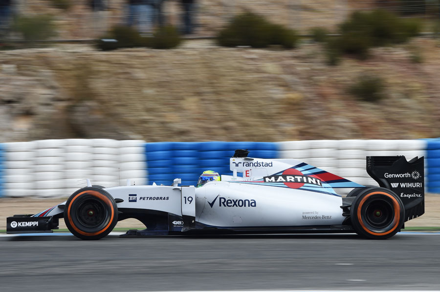 Felipe Massa gets the power down in the Williams FW37