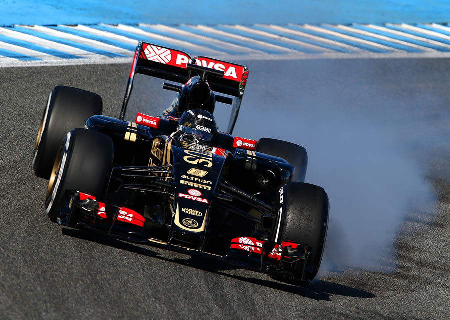 Romain Grosjean snatches a brake in the Lotus E23