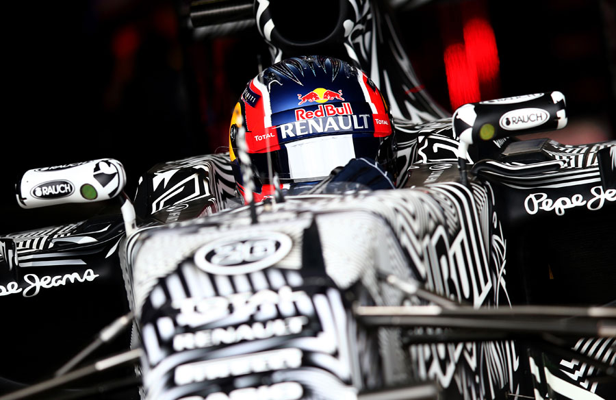 Daniil Kvyat leaves the garage in the Red Bull
