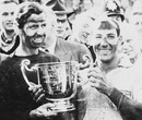 Stirling Moss and Tony Brooks celebrate winning the 1957 European Grand Prix