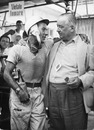 Stirling Moss celebrates winning the 1957 Pescara Grand Prix with Tony Vanderwell, designer of his winning Vanwall