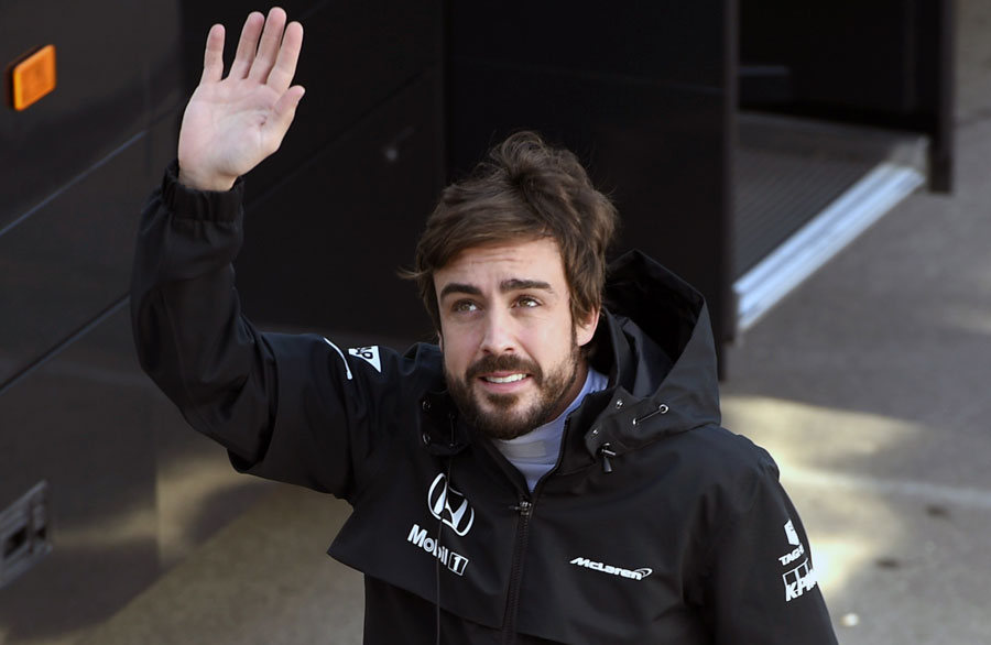 Fernando Alonso waves to his home supporters on Friday