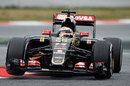 Pastor Maldonado bounces his Lotus E23 over a kerb