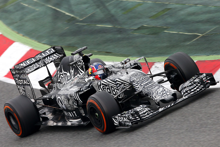 Daniil Kvyat puts the Red Bull RB11 through its paces