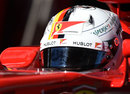 Sebastian Vettel leaves the garage