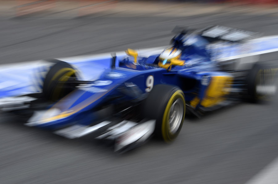 Marcus Ericsson powers down the pit lane in the C34