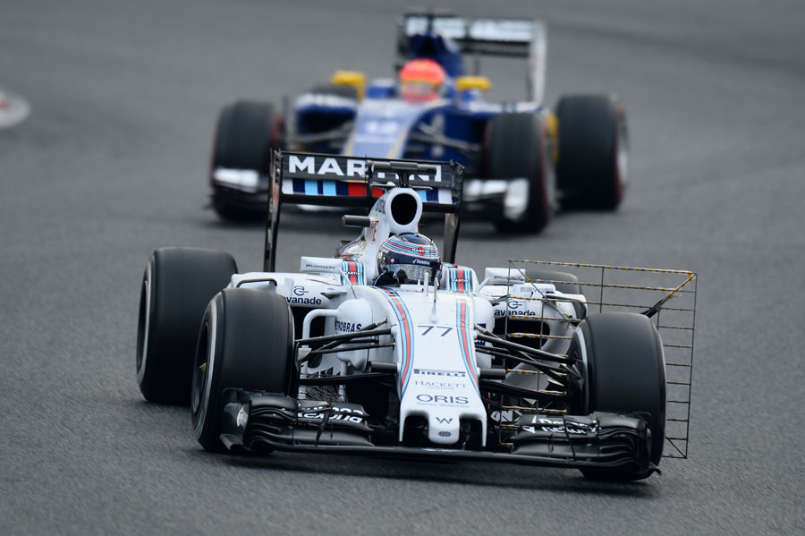 Valtteri Bottas on track with Sauber's Felipe Nasr in close attendance