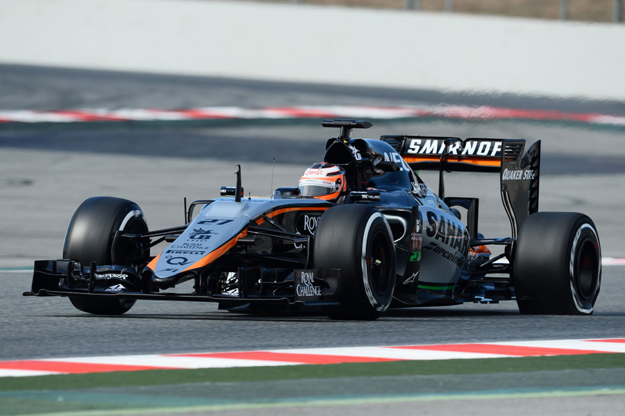 Nico Hulkenberg suffers a left rear tyre during the first ever lap of the VJM08