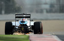 Sparks fly from the Williams of Valtteri Bottas