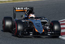 Nico Hulkenberg rounds the apex in his Force India