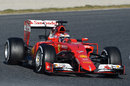 Kimi Raikkonen points his Ferrari towards a corner