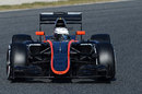Kevin Magnussen approaches a corner in the McLaren MP4-30