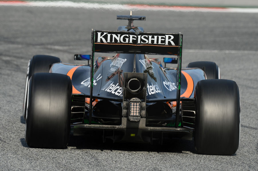 A rear view of the VJM08 on track
