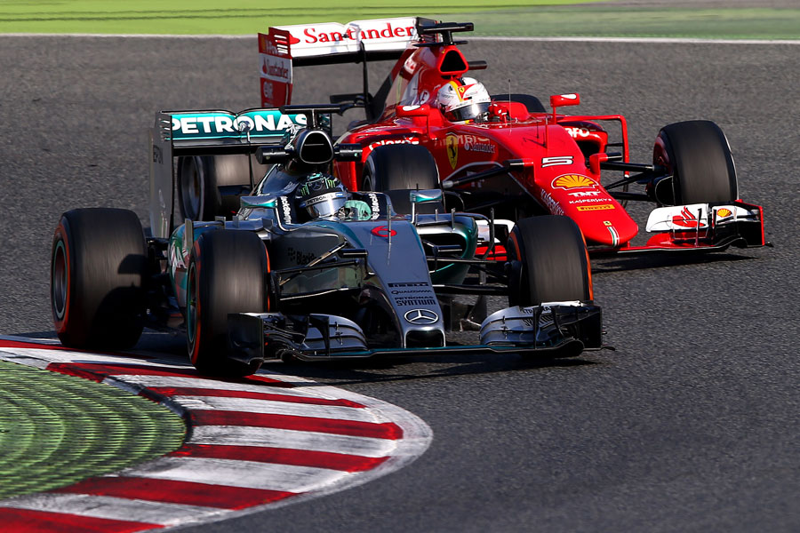 Nico Rosberg leads Sebastian Vettel on track