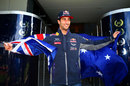 Local lad Daniel Ricciardo poses with the Australian flag on the Thursday before his home race