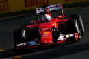 Sebastian Vettel turns into a corner in his Ferrari