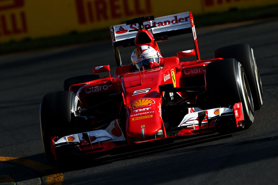 Sebastian Vettel turns into a corner in his Ferrari