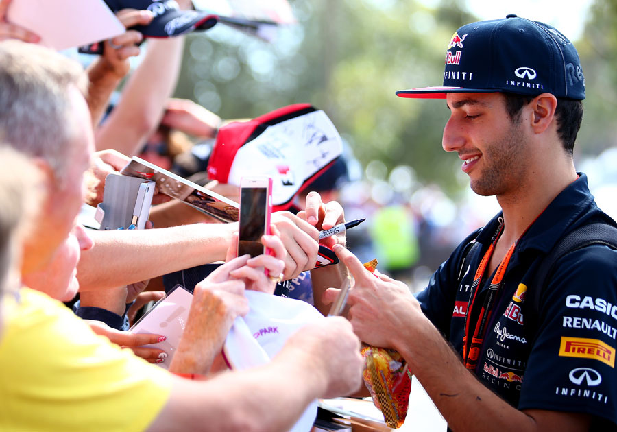 Daniel Ricciardo signs autographs for fans