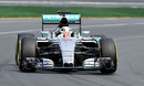 Lewis Hamilton points his Mercedes at the apex in qualifying