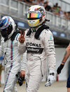 Lewis Hamilton celebrates taking pole position in Melbourne