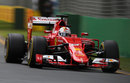 Sebastian Vettel powers down towards Turn 3