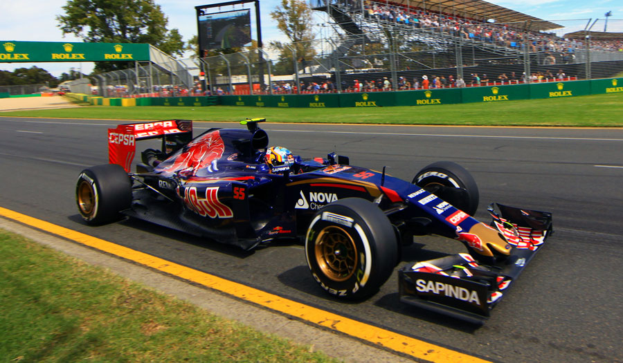 Carlos Sainz and his Toro Rosso approach the penultimate corner