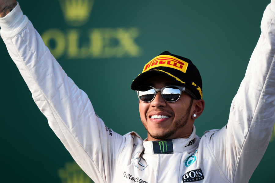 Lewis Hamilton celebrates his Melbourne victory on the podium