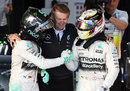 Nico Rosberg congratulates team-mate Lewis Hamilton on victory