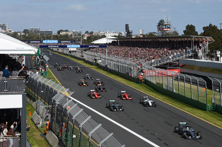 Lewis Hamilton leads the chasing pack down towards Turn 1 