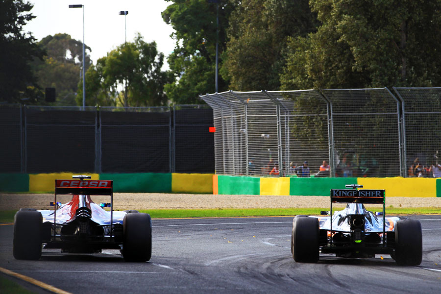Carlos Sainz and Sergio Perez battle for position