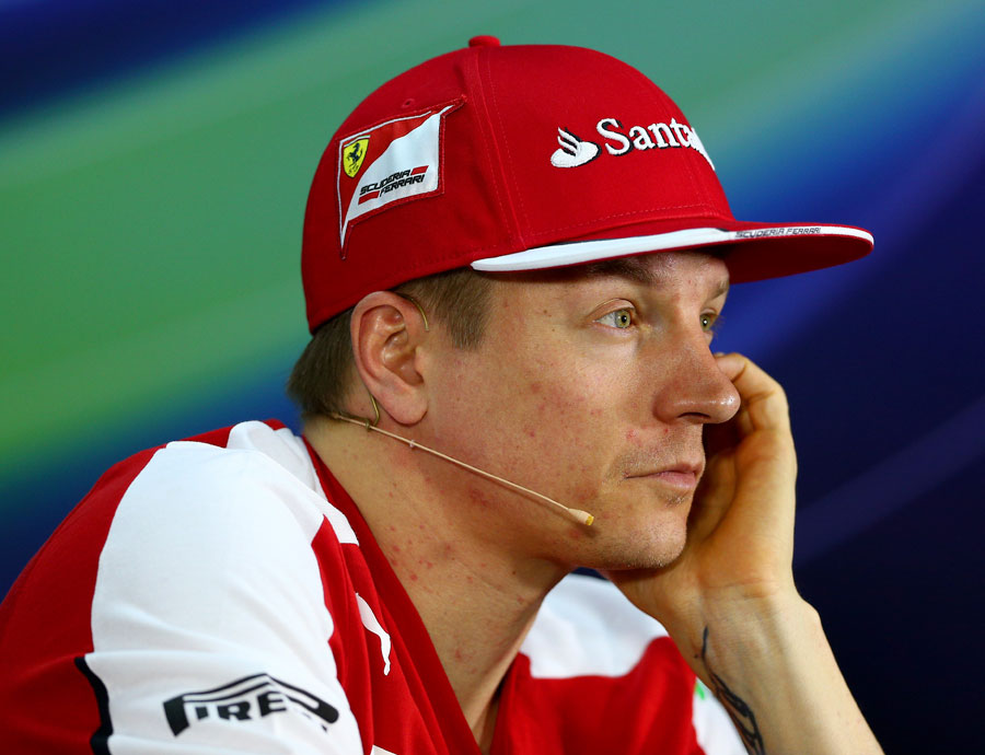 Kimi Raikkonen looks on during the Thursday press conference