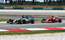 Kimi Raikkonen stalks the Mercedes of Lewis Hamilton in FP2